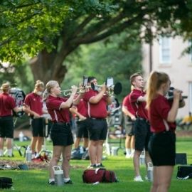 The Carolina Band playing on the horseshoe in a socially distant manner